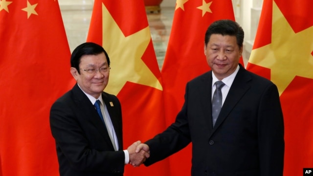 Ông Trương Tấn Sang trong một cuộc gặp với Chủ tịch Trung Quốc Tập Cận Bình ở Bắc Kinh hôm 10/11/2014. Cả hai nhà lãnh đạo Việt Nam cùng tới Mỹ để dự Hội nghị Thượng đỉnh của Liên Hiệp Quốc.