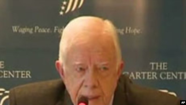 Former US president Jimmy Carter gives a press conference in Cairo, 13 January 2012 