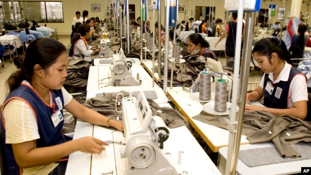 FILE - Cambodian garment workers sew clothes in a factory in Phnom Penh, Cambodia.