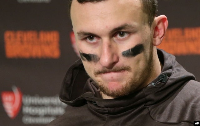 FILE - Cleveland Browns quarterback Johnny Manziel speaks with reporters.