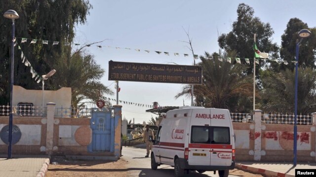 An ambulance enters an hospital located near the gas plant where hostages have been kidnapped by Islamic militants, in Ain Amenas, January 19, 2013.
