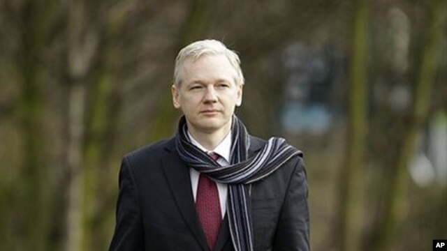 The founder of WikiLeaks website Julian Assange arrives for his extradition hearing at Belmarsh Magistrates' Court in London, February 24, 2011.