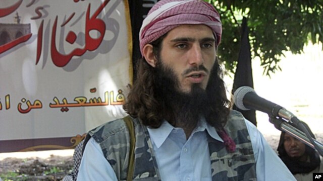 American born Islamist militant fighter Omar Hamammi, known as Abu Mansur Al-Amriki, adresses a press conference  at a farm in southern Mogadishu's Afgoye district, Somalia, May 11, 2011.