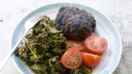 Grilled Kale with tomatoes and burger