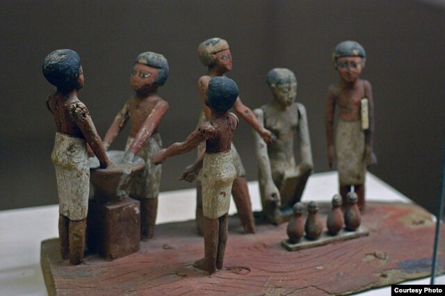 An early-Egyptian carving, held at the Rosecrucian-Egyptian Museum in California, depicts beer-making. (Wikipedia Commons)