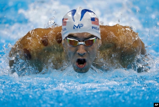 United States' Michael Phelps competes in a men's 200-meter butterfly heat during the swimming competitions at the 2016 Summer Olympics, Aug. 8, 2016, in Rio de Janeiro, Brazil.