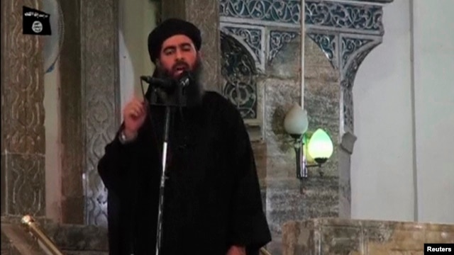 Hình ảnh từ video dường như cho thấy ông Abu Bakr al-Baghdadi đang thuyết giảng tại một ngôi đền ở Mosul, Iraq, ngày 5 tháng 7, 2014
