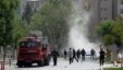 Security officers and firefighters work moments after an explosion outside the Police headquarters in Gaziantep, Turkey, May 1, 2016. 