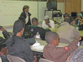 Deborah Estell, teacher and coordinator of the Omega Leadership Academy, conducts a class.