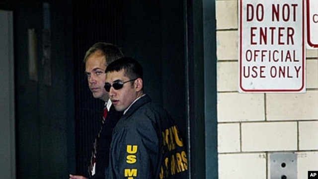 John Hinckley, left, at Federal Court in Washington, Sept. 2003 (file photo).