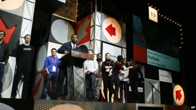 Sutradara dan penulis cerita Ryan Coogler menerima penghargaan tertinggi Festival Film Sundance untuk film drama "Fruitvale" di Park City, Utah, 26 Januari 2013. (Photo by Danny Moloshok/Invision/AP)