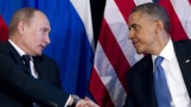 President Barack Obama shakes hands with Russian President Vladimir Putin, G20 Summit, Los Cabos, Mexico, June 18, 2012.