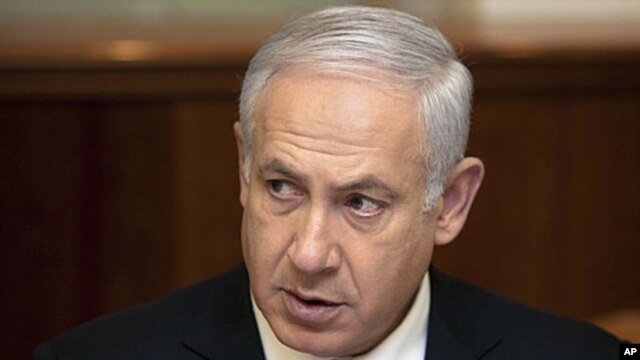 Israel's Prime Minister Benjamin Netanyahu, pictured here at a weekly meeting of his cabinet  April 3, 2011, has issued a written statement calling on the UN to retract its Gaza war crimes report