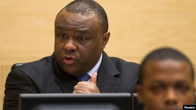 Jean-Pierre Bemba, a former vice president of the Democratic Republic of Congo, speaks at the opening of his trial in The Hague, Nov. 22, 2010. 