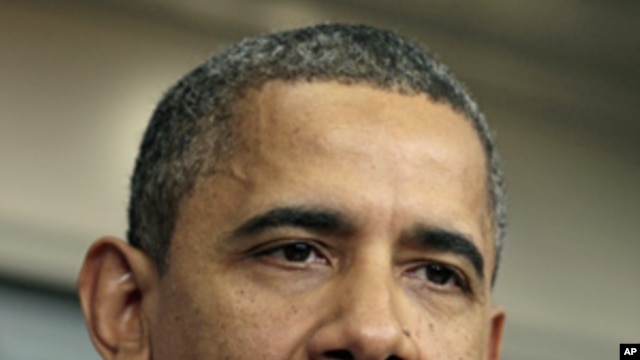 President Barack Obama in the White House briefing room, Dec. 8, 2011.