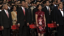 Former Hong Kong Chief Executives Tung Chee-hwa (front L), Donald Tsang (front R), new Hong Kong Chief Executive Leung Chun-ying (front 2nd L), his wife during a ceremony in Hong Kong, July 1, 2012.