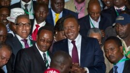 Kenya's President-Elect Uhuru Kenyatta arrives at the the National Election Center where final election results were announced declaring he would be the country's next president, in Nairobi,March 9, 2013. 