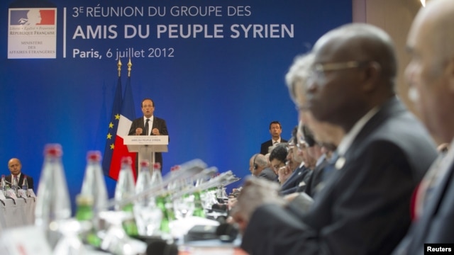 French President Francois Hollande addresses third meeting of the "Friends of Syria," Paris, July 6, 2012.