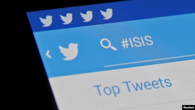 FILE - The Islamic State hashtag (#ISIS) is seen typed into the Twitter application on a smartphone in this picture illustration taken in Zenica, Bosnia and Herzegovina.