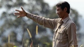 Chut Wutty, former Director of the Natural Resource Protection Group, gestures at Botum Sakor National Park in Koh Kong province, Cambodia, file photo.) 