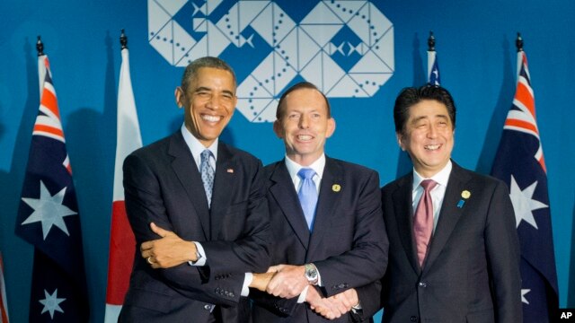 Ba nhà lãnh đạo Mỹ, Australia và Nhật Bản gặp nhau ở Brisbane bên lề thượng đỉnh G20, ngày 16/11/2014.