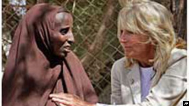 Jill Biden, wife of U.S. Vice President Joe Biden, center, sits with Somali refugees at a UNHCR screening center on the outskirts of Ifo camp outside Dadaab, eastern Kenya, 100 kms (60 miles) from the Somali border, Aug. 8, 2011.