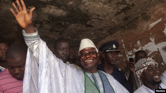 Sierra Leone's incumbent President Ernest Bai Koroma waves to supporters after voting in the capital Freetown, November 17, 2012.