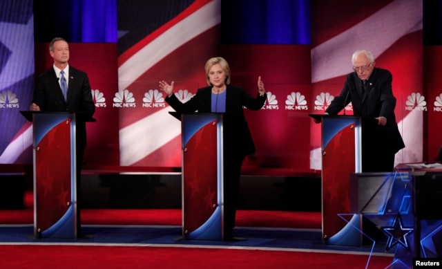 From left, Democratic U.S. presidential candidates former Maryland Gov. Martin O'Malley, former Secretary of State Hillary Clinton and Senator Bernie Sanders of Vermont participate in a debate in Charleston, S.C., Jan. 17, 2016.