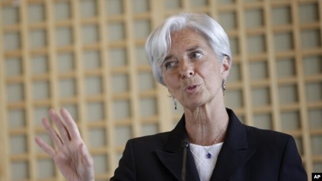 French Finance Minister Christine Lagarde gestures during a press conference, in Paris, May 25, 2011