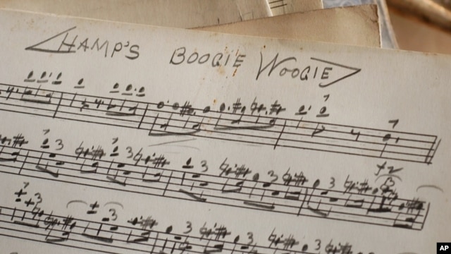 FILE - An original handwritten song by Lionel Hampton titled "Hamp's Boogie Woogie" is seen at the Colored Musicians Club in Buffalo, New York, Jan. 14, 2005. 
