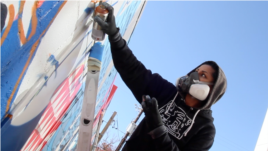 “Graffiti artist Cita Sadeli, aka Chelove, spray-paints a mural in a recent episode of ZirZameen.”