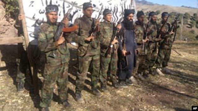 This photo released in a statement by the Pakistani Taliban shows the fighters who stormed a military-run school in Peshawar, Pakistan, Dec. 16, 2014.