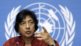 U.N. High Commissioner for Human Rights Navi Pillay gestures during a press conference in Geneva.