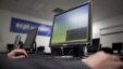 U.S. Marine Sergeant Michael Kidd works on a computer at ECPI University in Virginia Beach, Virginia, February 7, 2012.