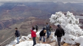 Visitors at the Grand Canyon's Yavapai Point