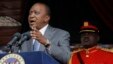 FILE - Kenyan President Uhuru Kenyatta delivers a speech at the Nyayo National Stadium in Nairobi. 