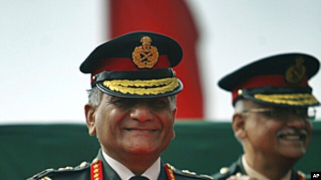 Indian Army Chief Gen. V.K. Singh smiles during a ceremony on the occasion of the Indian Army Day in New Delhi, India, FILE January 15, 2012. 