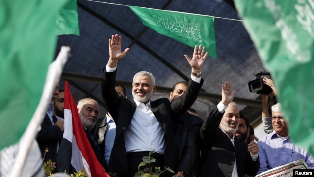 Lãnh đạo cấp cao của phe Hamas Ismail Haniyeh ăn mừng cuộc hưu chiến sau 8 ngày xung đột tại Gaza City, ngày 22/11/2012.