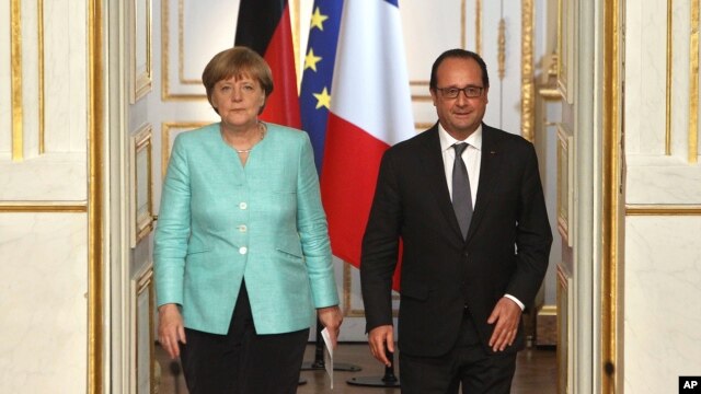 Германия и Франция: следующий шаг должны сделать Афины