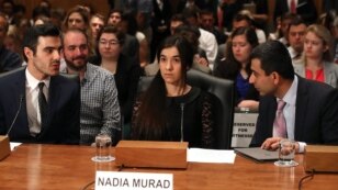 Nadia Murad, (C), human rights activist, testifies during Senate Homeland Security and Governmental Affairs Committee hearing on Capitol Hill in Washington, June 21, 2016. 