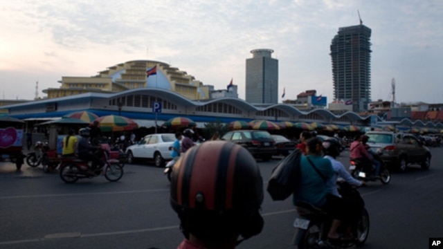 Phnom Penh's skyline is fast seeing new skyscrapers, prompting artists to create works commenting on the rapid urbanization in the city. – Yong YN