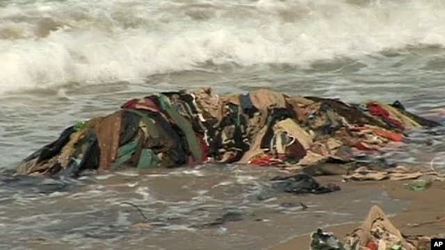 Off the coast of Saida, Lebanon garbage spills into the Mediterranean Sea from what is known locally as "trash mountain"
