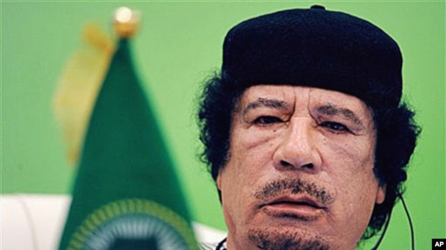 Libyan leader Moammar Gadhafi talks during the first session of the 3rd Africa-EU Summit in Tripoli, Libya, November 29, 2010 (file photo)