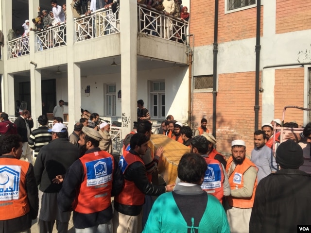 Emergency responders on scene of attack at Bacha Khan University in Charsadda, Pakistan, Jan. 20, 2016. (Photo: N. Takar / VOA Deewa)