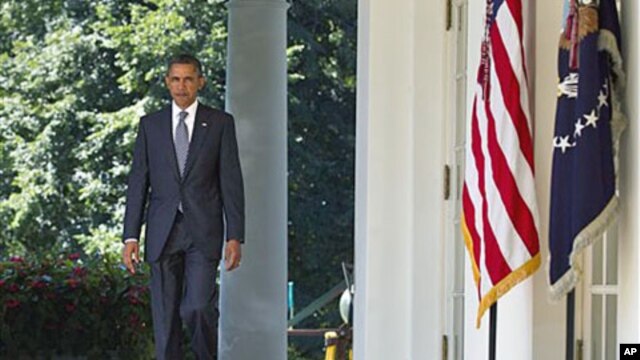 President Barack Obama walks to the Rose Garden of the White House in Washington, DC, August 31, 2011.