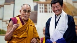 Lobsang Sangay, prime minister of the Tibetan government-in-exile, right, and the Dalai Lama visit the Tibetan Children’s Village School in Dharmsala, India, on June 5, 2014.