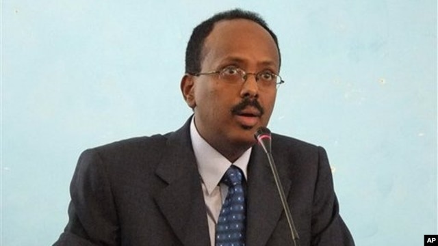 Somali Prime Minister Mohamed Abdullahi Mohamed after his swearing-in ceremony at the Presidential residence in Mogadishu, Somalia. Monday Nov. 1, 2010
