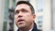 Rep. Michael Grimm speaks to the media outside Federal court in Brooklyn after pleading guilty to a federal tax evasion charge rather than go to trial, in New York, Dec. 23, 2014. 