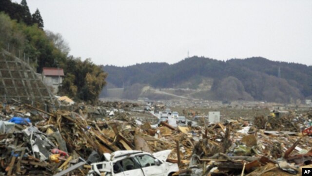 A month following the quake and tsunami much of Rikuzentakata in Iwate Prefecture still lies in ruin.
