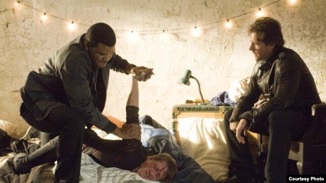TYLER PERRY (left) and EDWARD BURNS (right) star in ALEX CROSS
